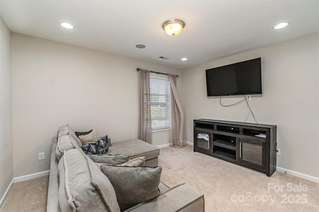 living room featuring light carpet