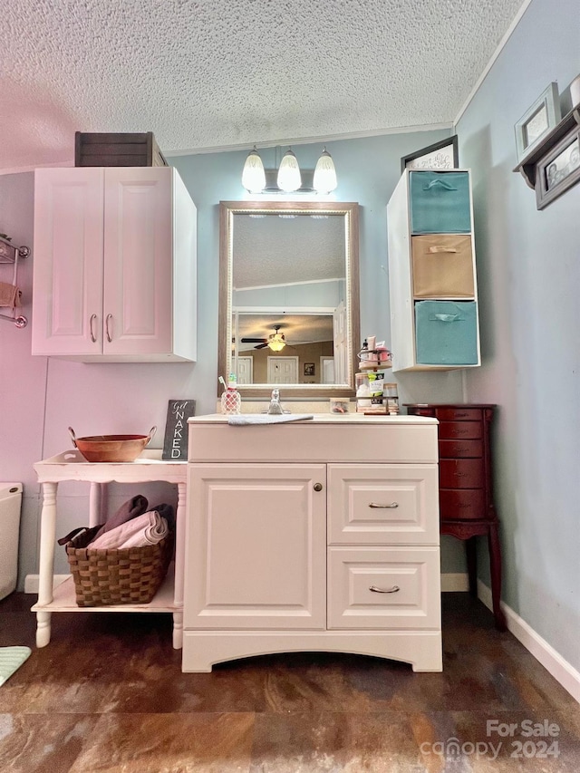 940 Devil Track Rd, Taylorsville, NC 28681 - bathroom with a textured ceiling and vanity