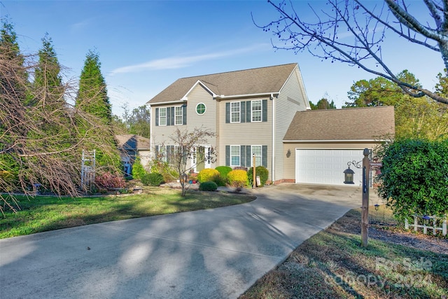 colonial house featuring a garage