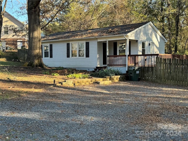 ranch-style house with covered porch