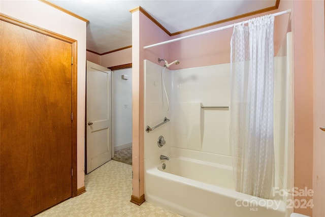 bathroom featuring shower / bathtub combination with curtain and crown molding