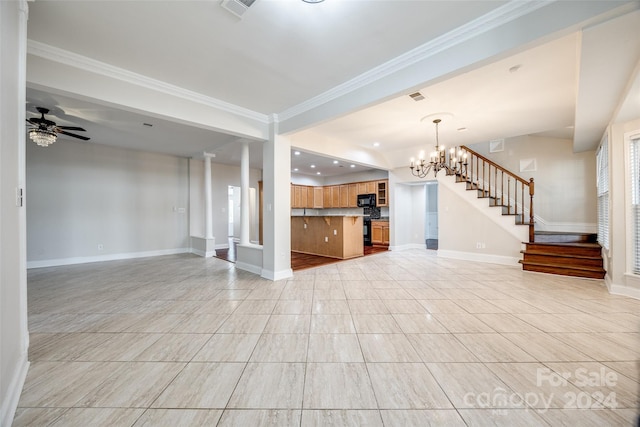 unfurnished living room featuring ceiling fan with notable chandelier and ornamental molding