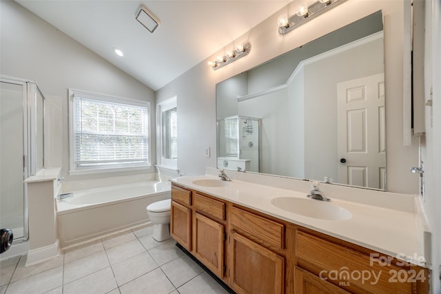 full bathroom with tile patterned floors, vanity, shower with separate bathtub, and vaulted ceiling