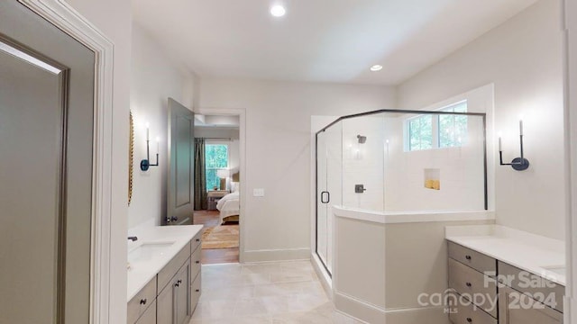 bathroom featuring vanity and walk in shower