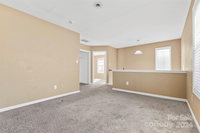 view of carpeted spare room