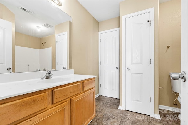 bathroom with vanity and walk in shower