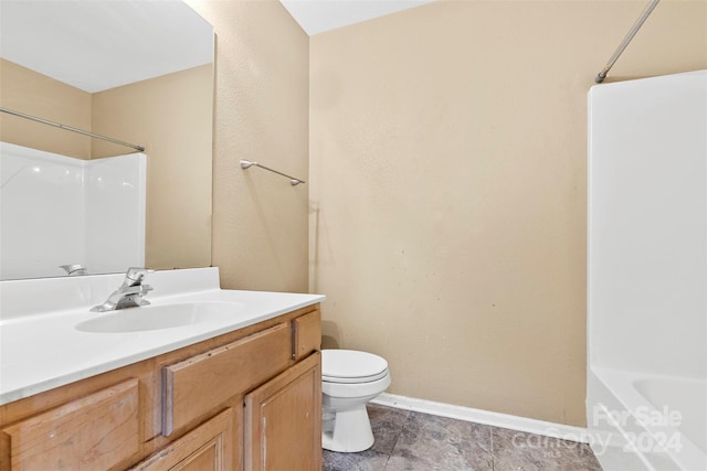 full bathroom with tile patterned floors, vanity, toilet, and  shower combination