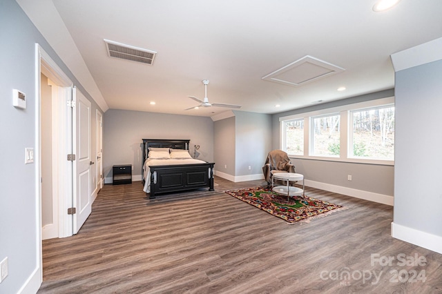 bedroom featuring dark hardwood / wood-style flooring and ceiling fan