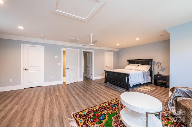 bedroom with ceiling fan and dark wood-type flooring