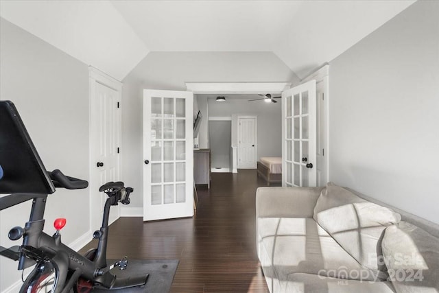 workout room featuring dark hardwood / wood-style floors, vaulted ceiling, ceiling fan, and french doors