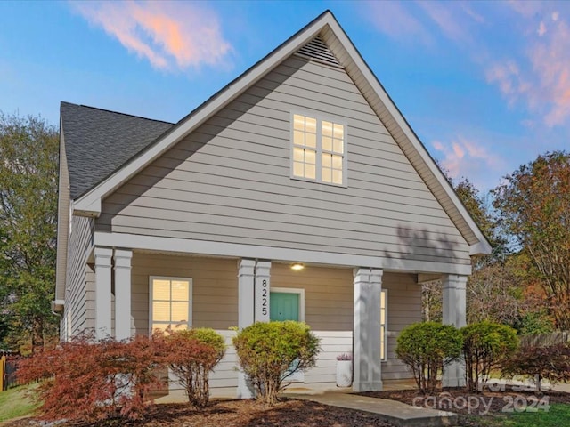 view of front of home featuring covered porch