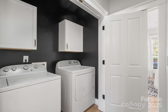 8225 Ballymore Ct, Huntersville, NC 28078 - laundry room featuring cabinet space and separate washer and dryer