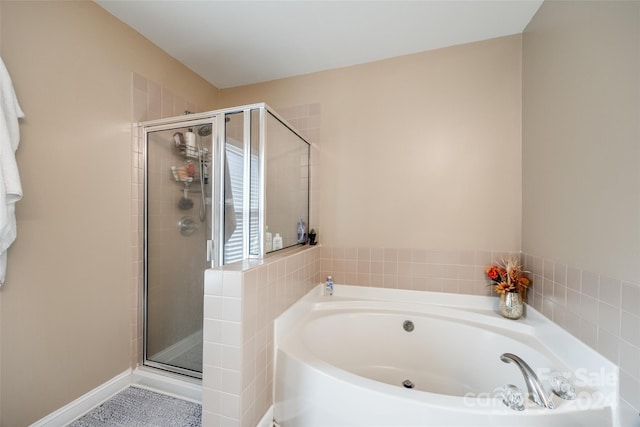 bathroom featuring plus walk in shower