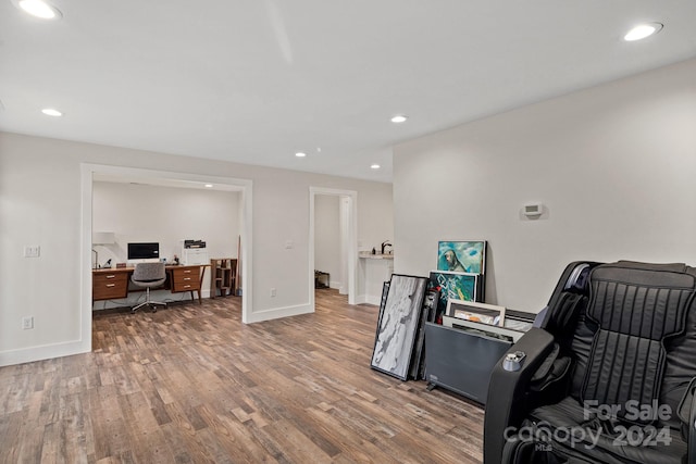 office space with hardwood / wood-style flooring