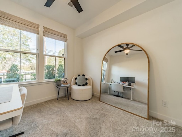 unfurnished room with carpet flooring, a healthy amount of sunlight, baseboards, and a ceiling fan