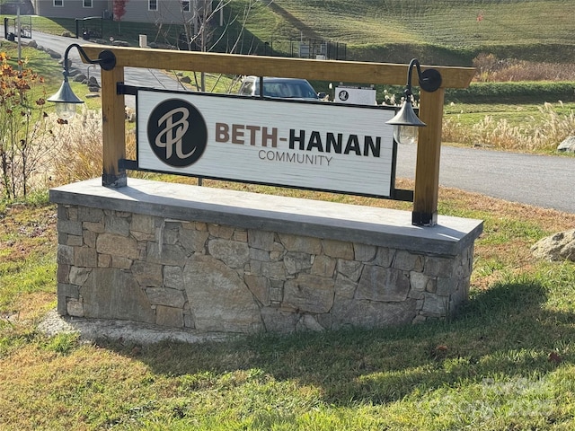 view of community sign