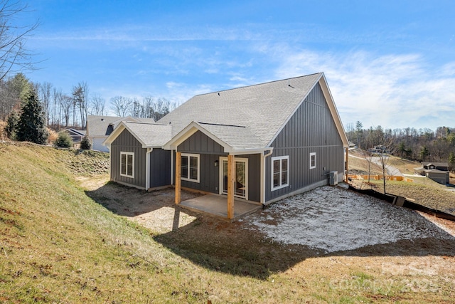 297 Bethany Dr, Mars Hill, NC 28754 - rear view of house featuring a patio, roof with shingles, a lawn, and cooling unit