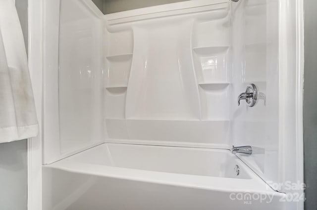 bathroom with shower / bath combination