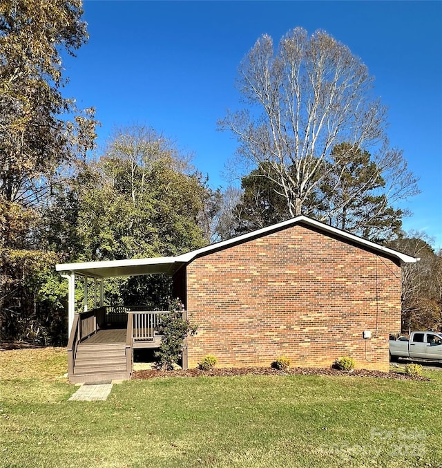 view of home's exterior with a lawn