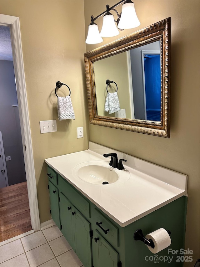 bathroom with vanity and tile patterned floors