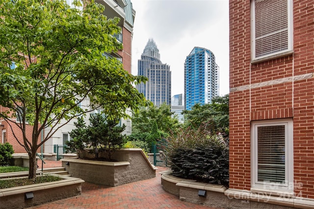 surrounding community featuring a patio