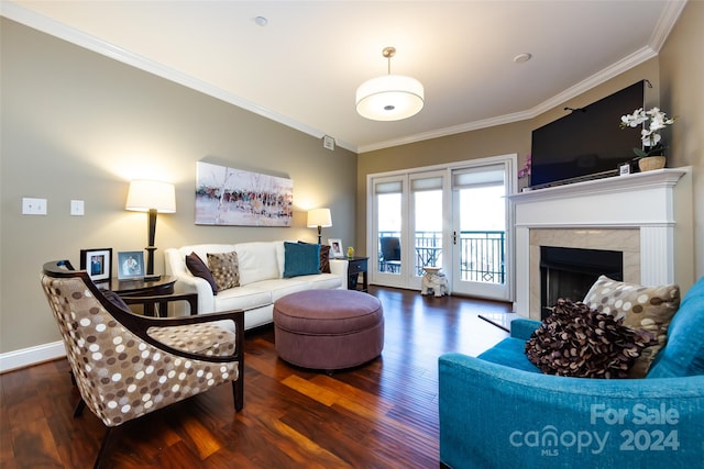 living room featuring a high end fireplace, dark hardwood / wood-style flooring, and crown molding