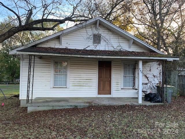 bungalow-style home with a porch