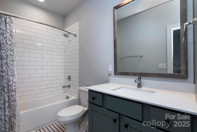 full bathroom featuring vanity, shower / bath combo with shower curtain, and toilet