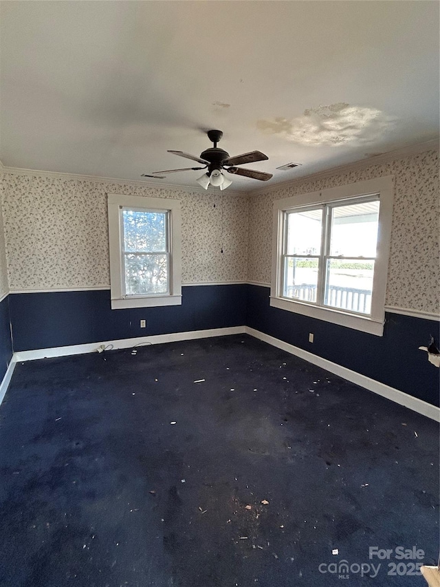 spare room featuring ceiling fan