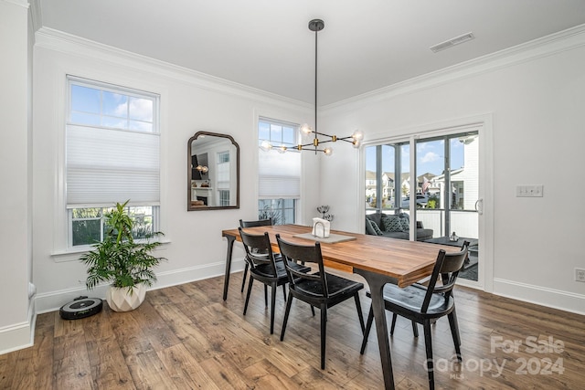 dining room featuring a wealth of natural light and hardwood / wood-style flooring