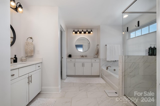 bathroom featuring plus walk in shower and vanity