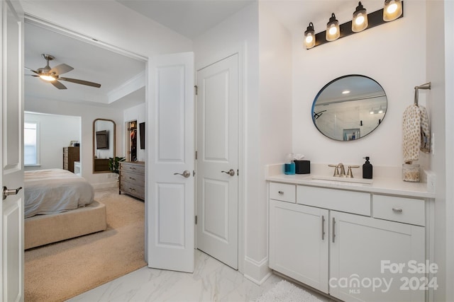 bathroom featuring vanity and ceiling fan