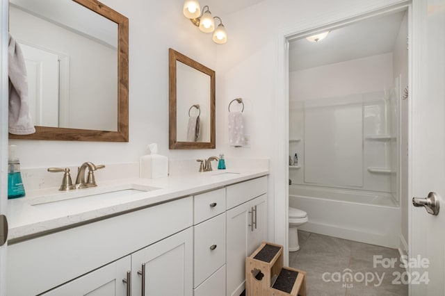 full bathroom with tile patterned floors, vanity, toilet, and tub / shower combination