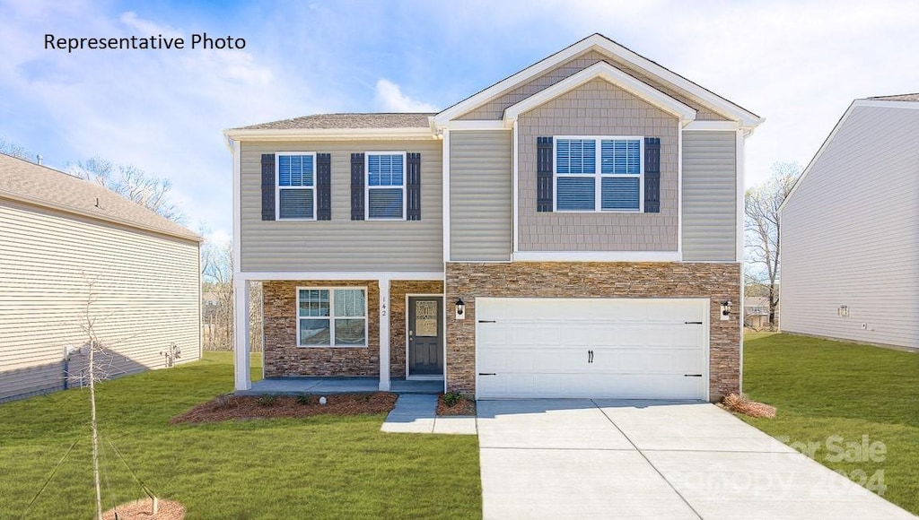 craftsman-style home with a garage and a front yard