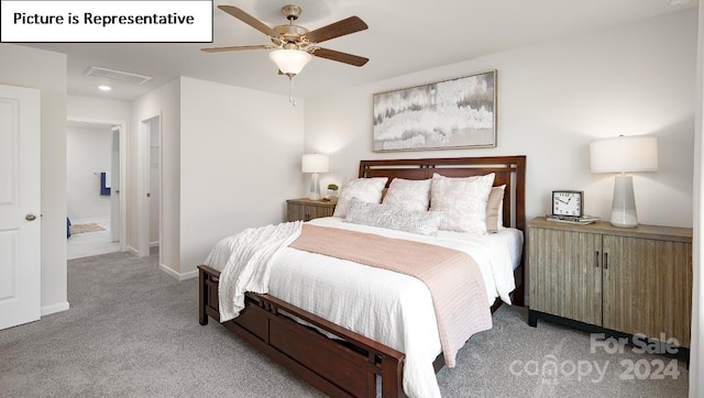 carpeted bedroom with ceiling fan