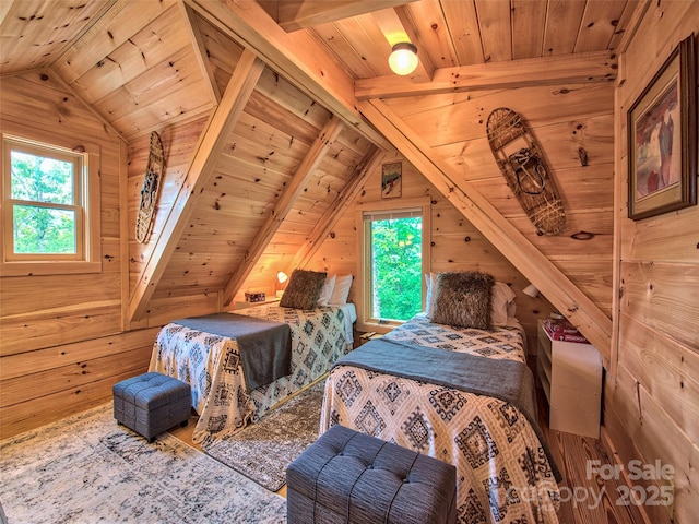 bedroom with multiple windows, vaulted ceiling with beams, and wood walls