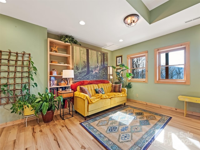 sitting room with light hardwood / wood-style floors