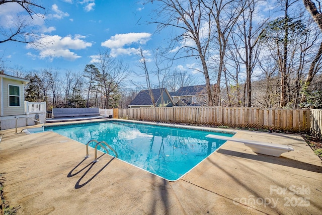 view of pool featuring a fenced in pool, a patio area, and a fenced backyard