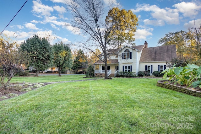 view of yard featuring a porch