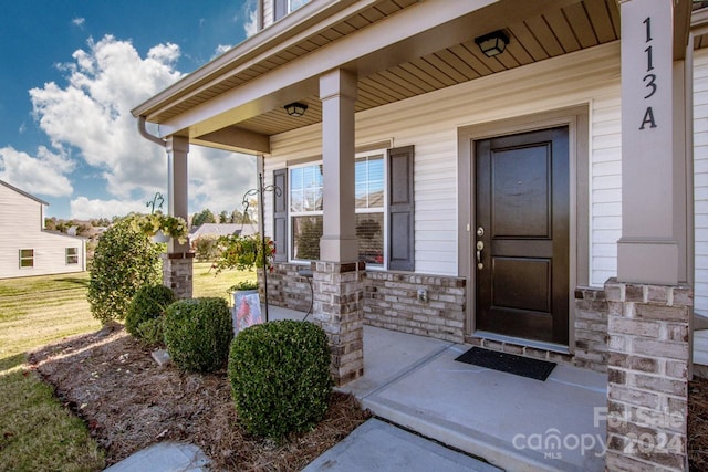 property entrance with a porch