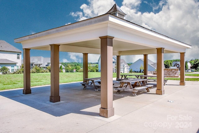 view of home's community featuring a gazebo and a lawn