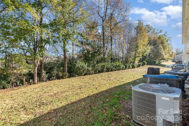 view of yard featuring central AC unit