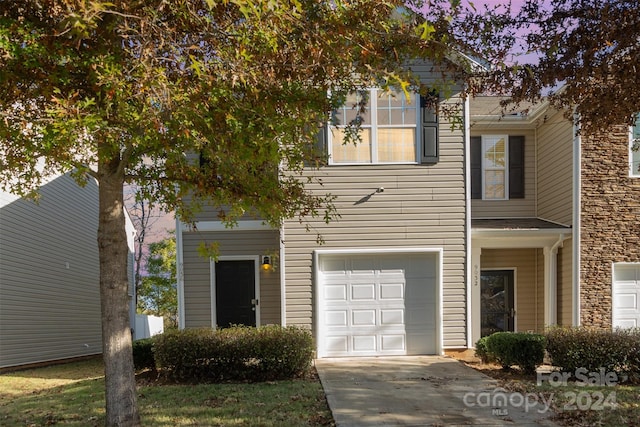 9036 Bradstreet Commons Way, Charlotte, NC 28215 - view of front of house featuring driveway and a garage