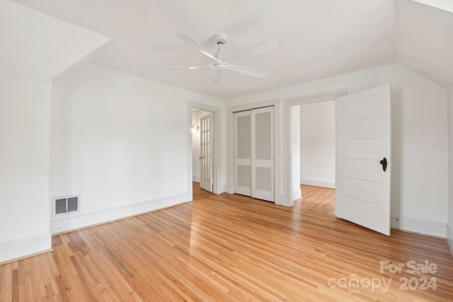 additional living space with ceiling fan and hardwood / wood-style flooring