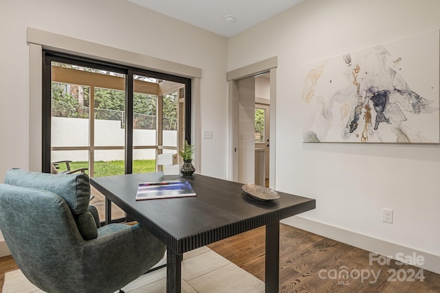 office area featuring plenty of natural light and dark wood-type flooring