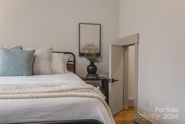 bedroom with wood-type flooring