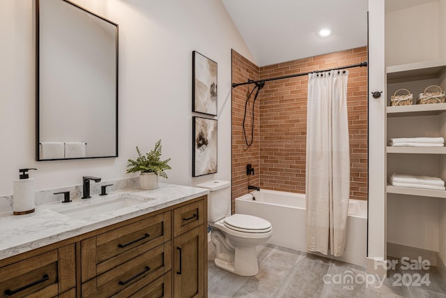 full bathroom featuring vanity, toilet, lofted ceiling, and shower / tub combo with curtain