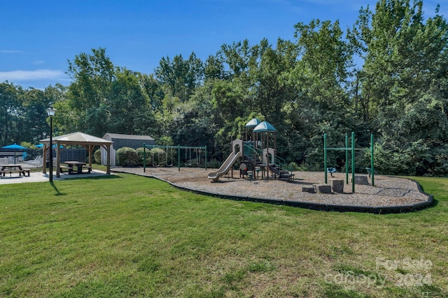 view of play area featuring a gazebo and a lawn