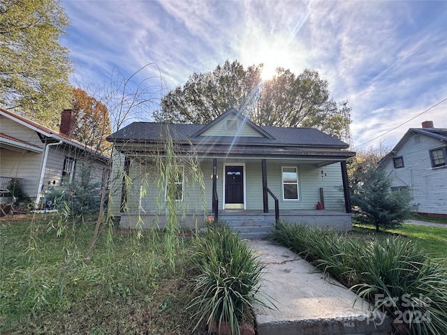 bungalow-style home with covered porch