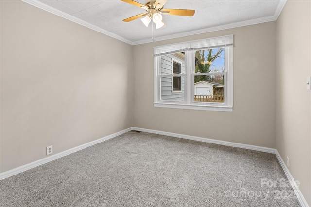 unfurnished room with ceiling fan, crown molding, carpet, and baseboards